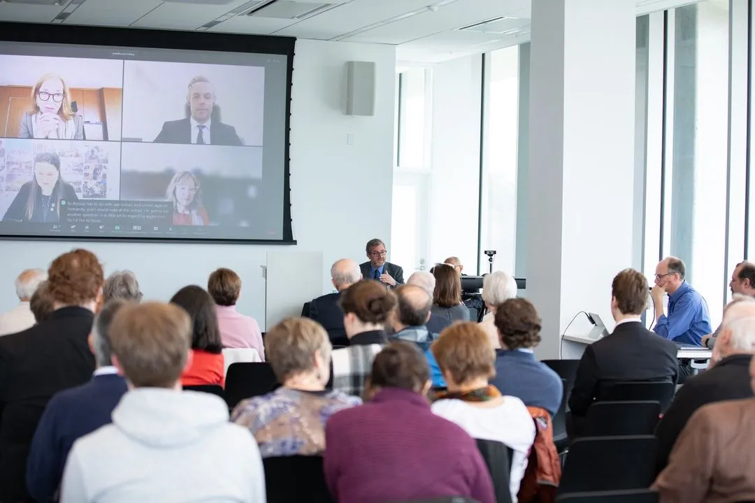 Scholars engaged in an interactive session during an AFAvH conference.