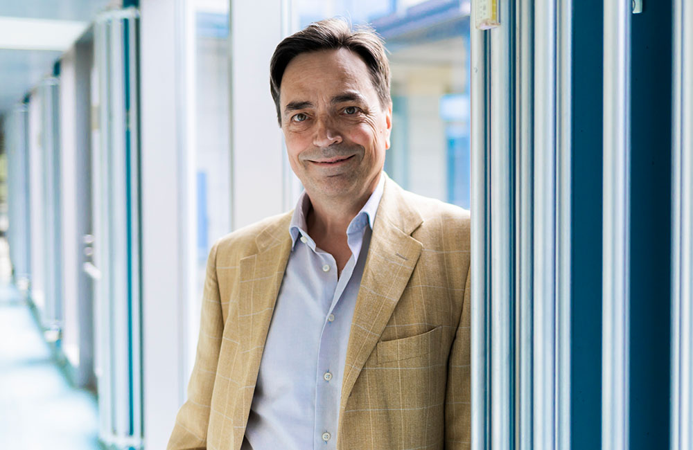 Portrait of Prof. Bernhard Sabel, highlighting his academic achievements.