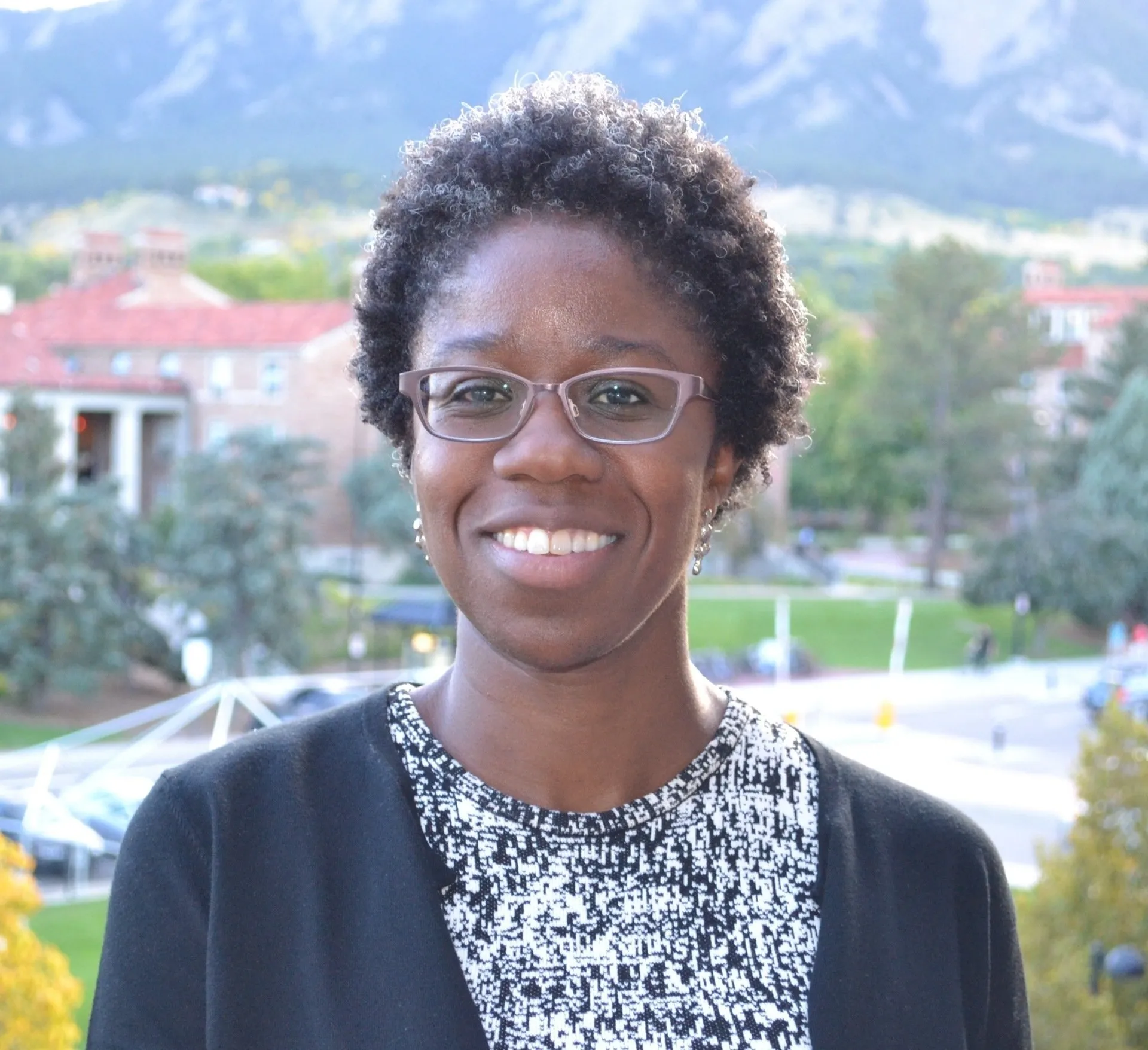 Portrait of Andrea Stith from October 2014, highlighting her academic contributions.