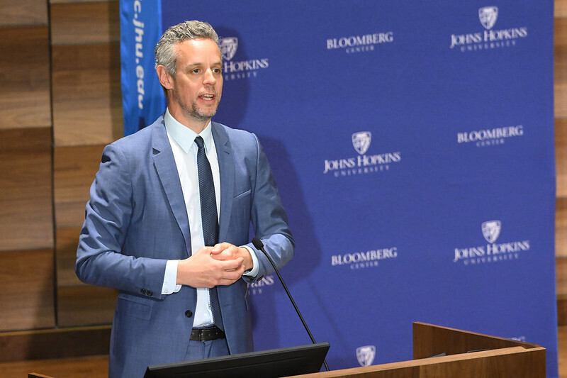 Photo of AFAvH President Christian Haenel presenting at the JHU Bloomberg Center.