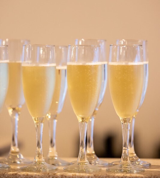 Image from a happy hour event taken by Silvia, emphasizing community and networking.